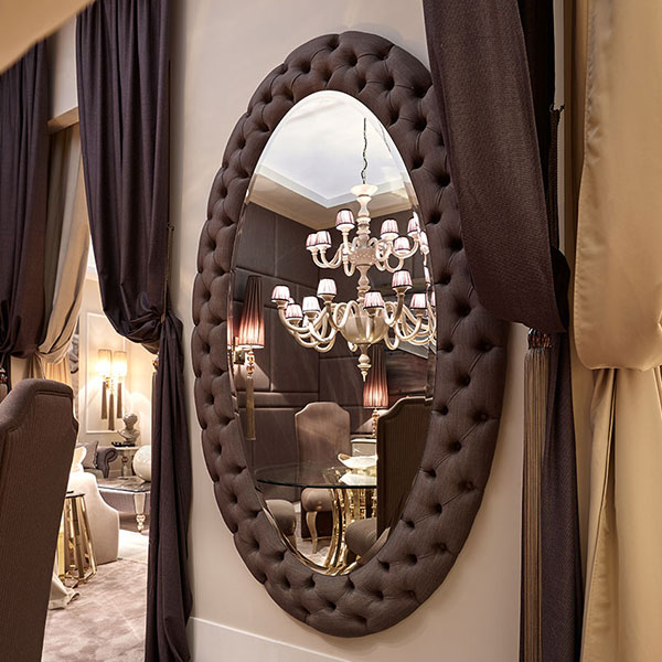 4028<br>
buttoned oval mirror  
225 x 9 x 132 cm