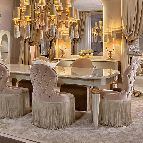 1650<br>
extending dining table, turned legs with amber crystal balls   
180/330 x 140 x 81 cm<br>

1651<br>
button back chair   
58 x 65 x 100 cm<br>

PML01<br>
20-light chandelier, gold glaze finish with amber crystal balls and tassels,
complete with lampshades
Ø 128 H. 106 cm<br>

1652<br>
2-door Art Deco display cabinet   
104 x 48 x 175 cm<br>
      
1653 <br>
2-door sideboard with central drawer  
185 x 48 x 90 cm<br>

PML02<br>
2-light lamp, gold glaze finish with amber crystal balls complete with shades 
35 x 20 x 80 cm<br>

G3042 <br>
floor lamp with steel frame, gold finish, amber crystal balls and tassel, complete with shade  
30 x 20 x 186 cm<br>

7035<br>
curtain tie back with amber crystal ball and tassel 
H. 120 cm  <br>

L4013<br>
Led backlit arch mirror   
100 x 7 x 180 cm
